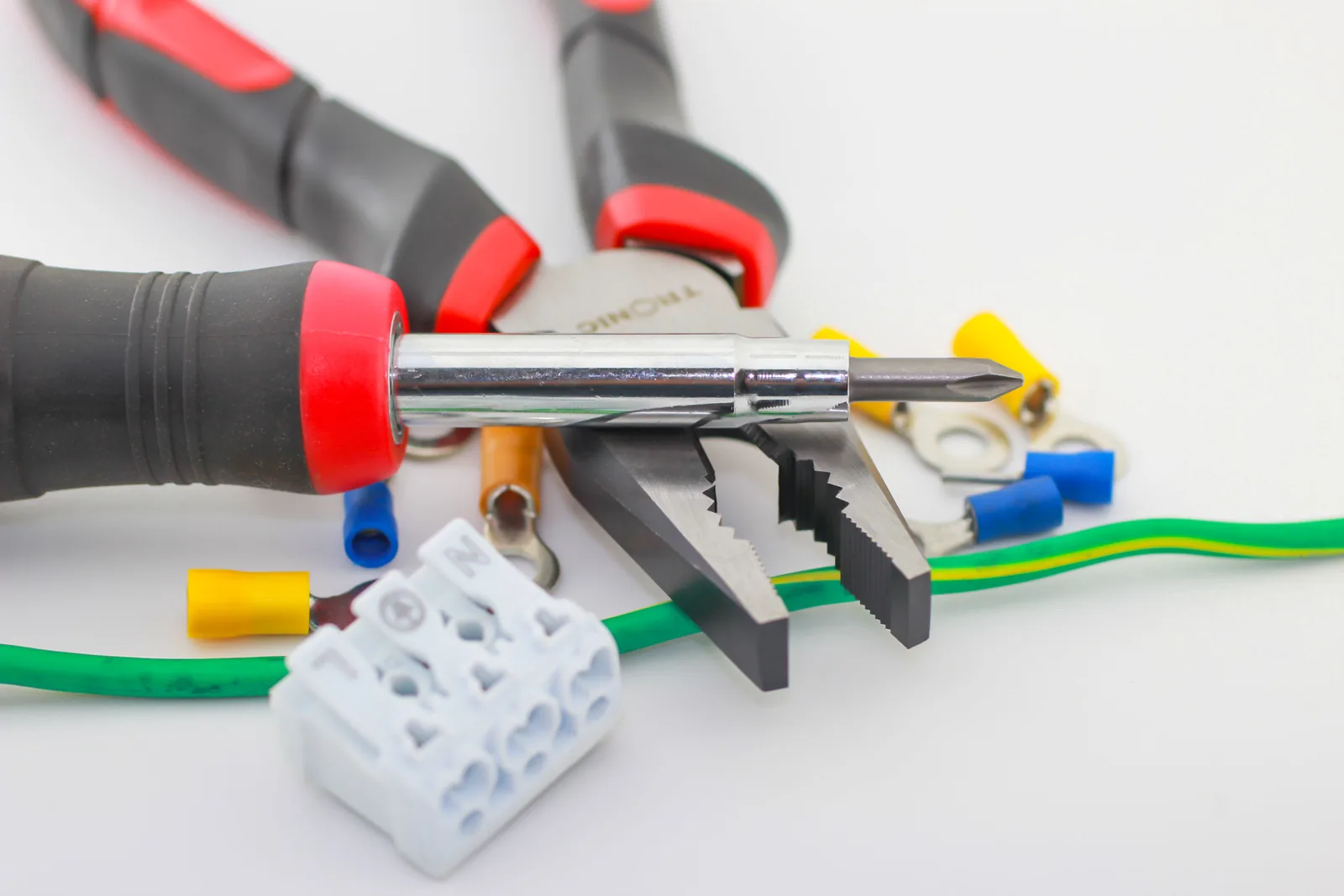 Pliers, a screwdriver, ferrules and a connector block, for electrician in Edmonton