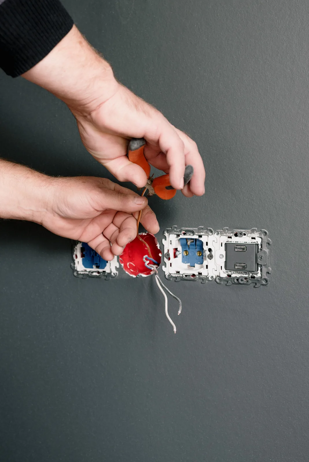 Stripping conductors at an outlet box, for outlet installation in Edmonton
