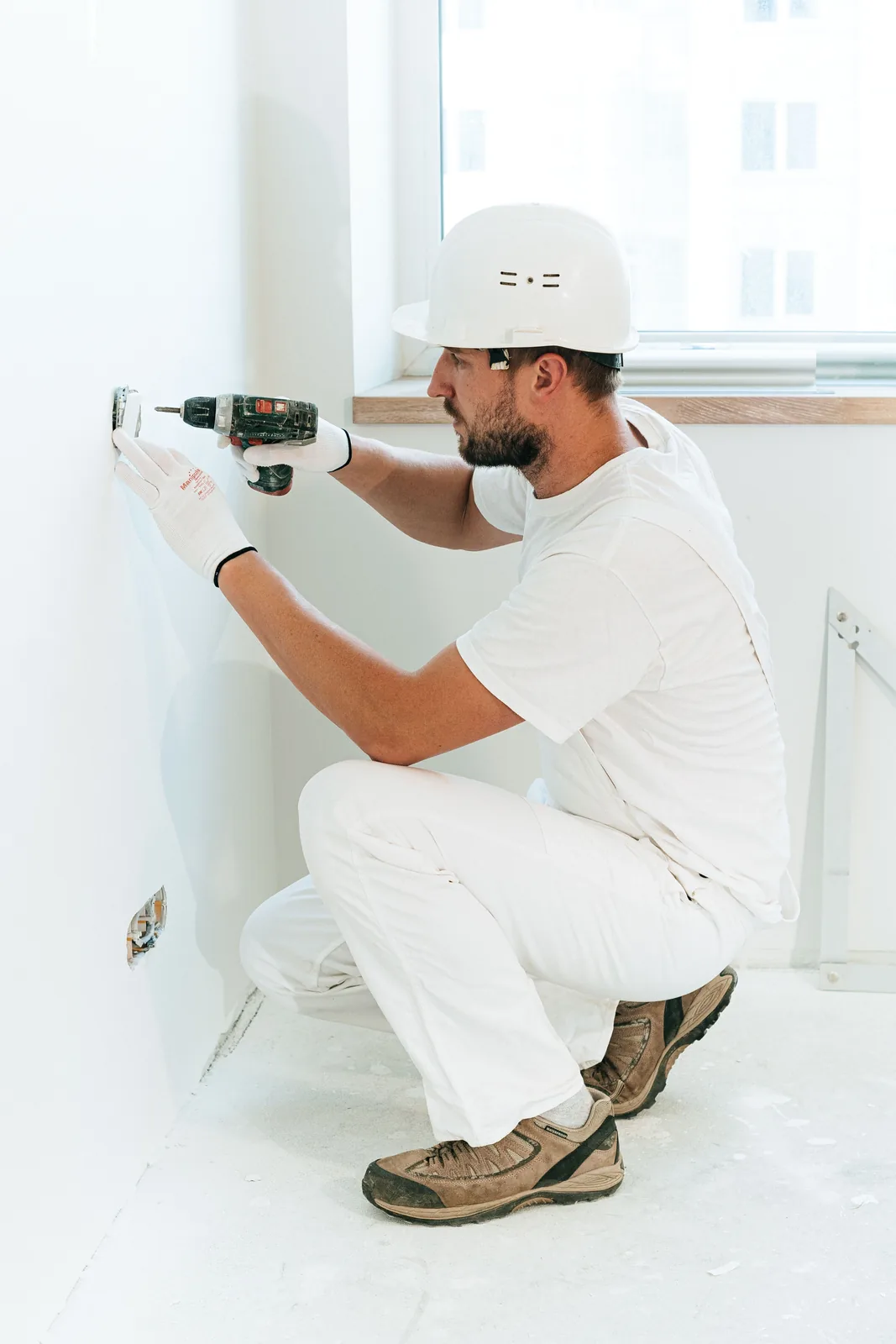 Fixing a socket into a finished wall, for electrician in Edmonton